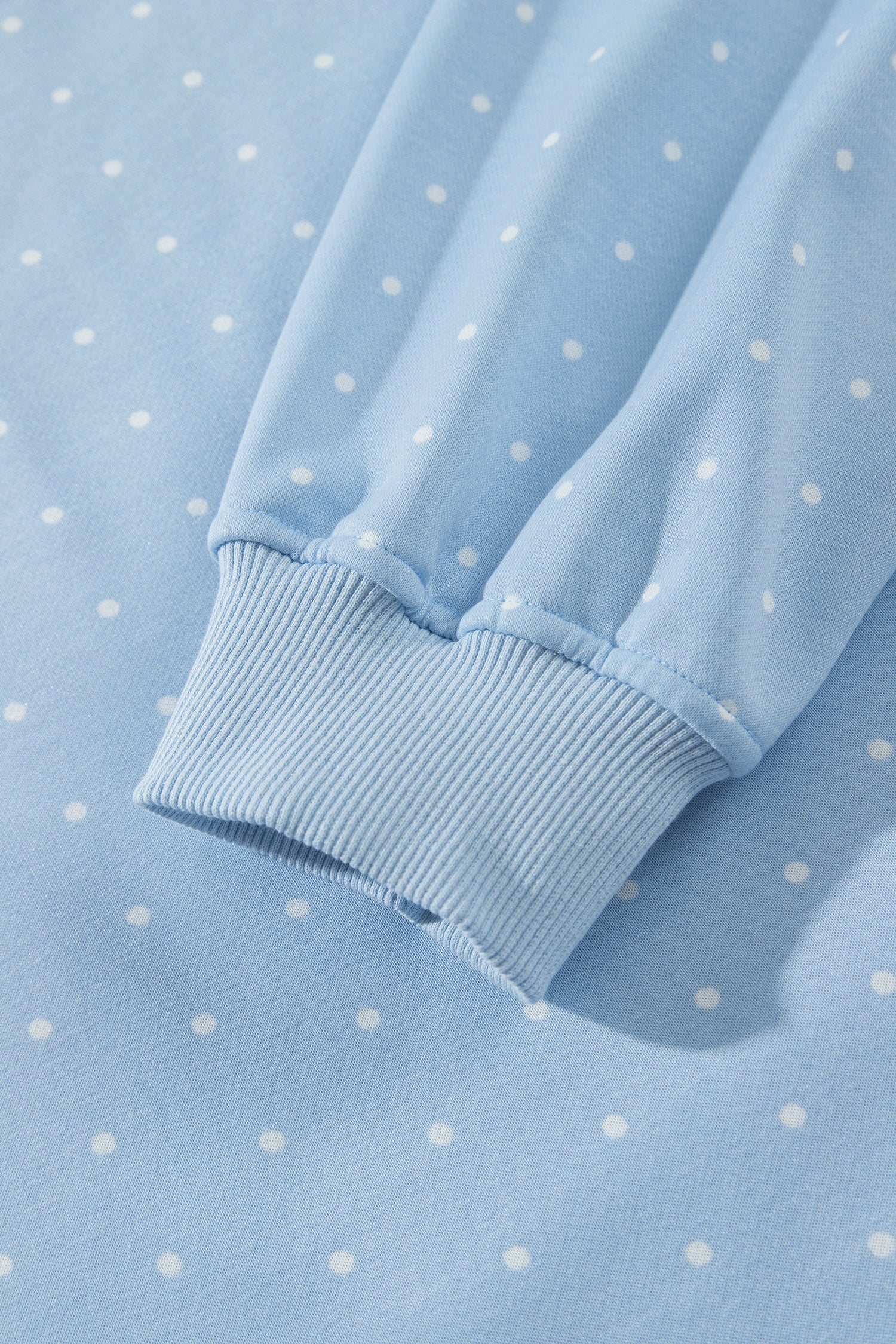 Sky blue polka dot hoodie ribbed cuff detail
