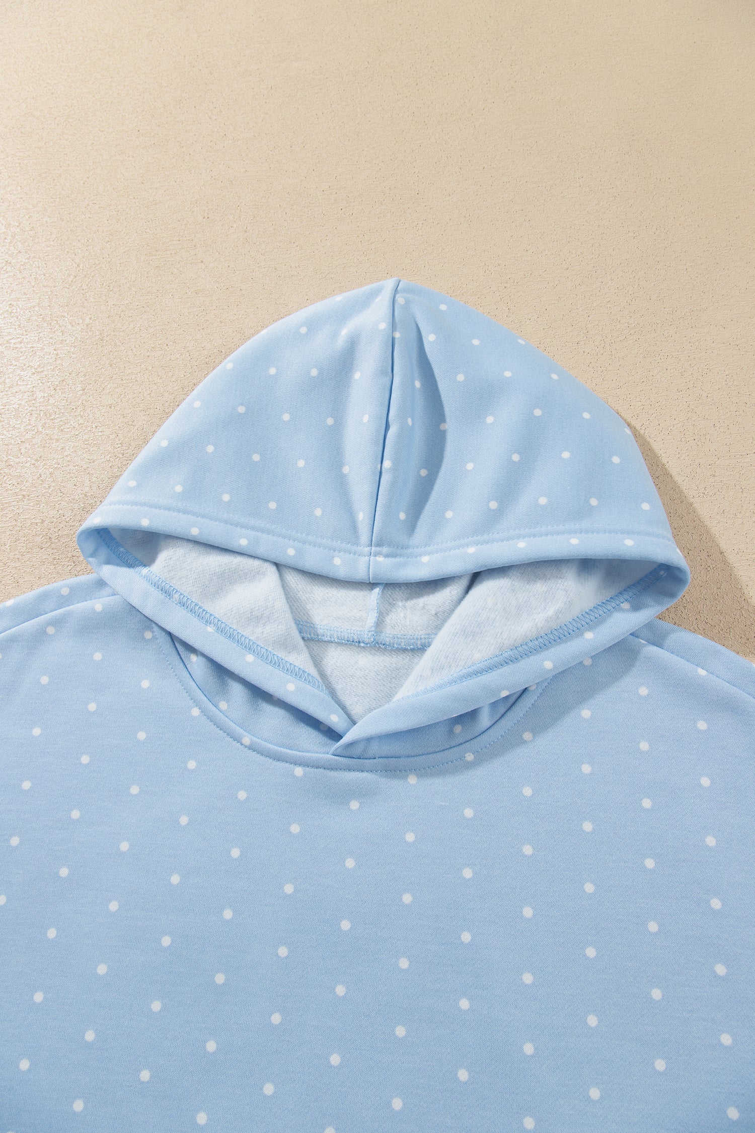 Sky blue polka dot hoodie lined hood detail