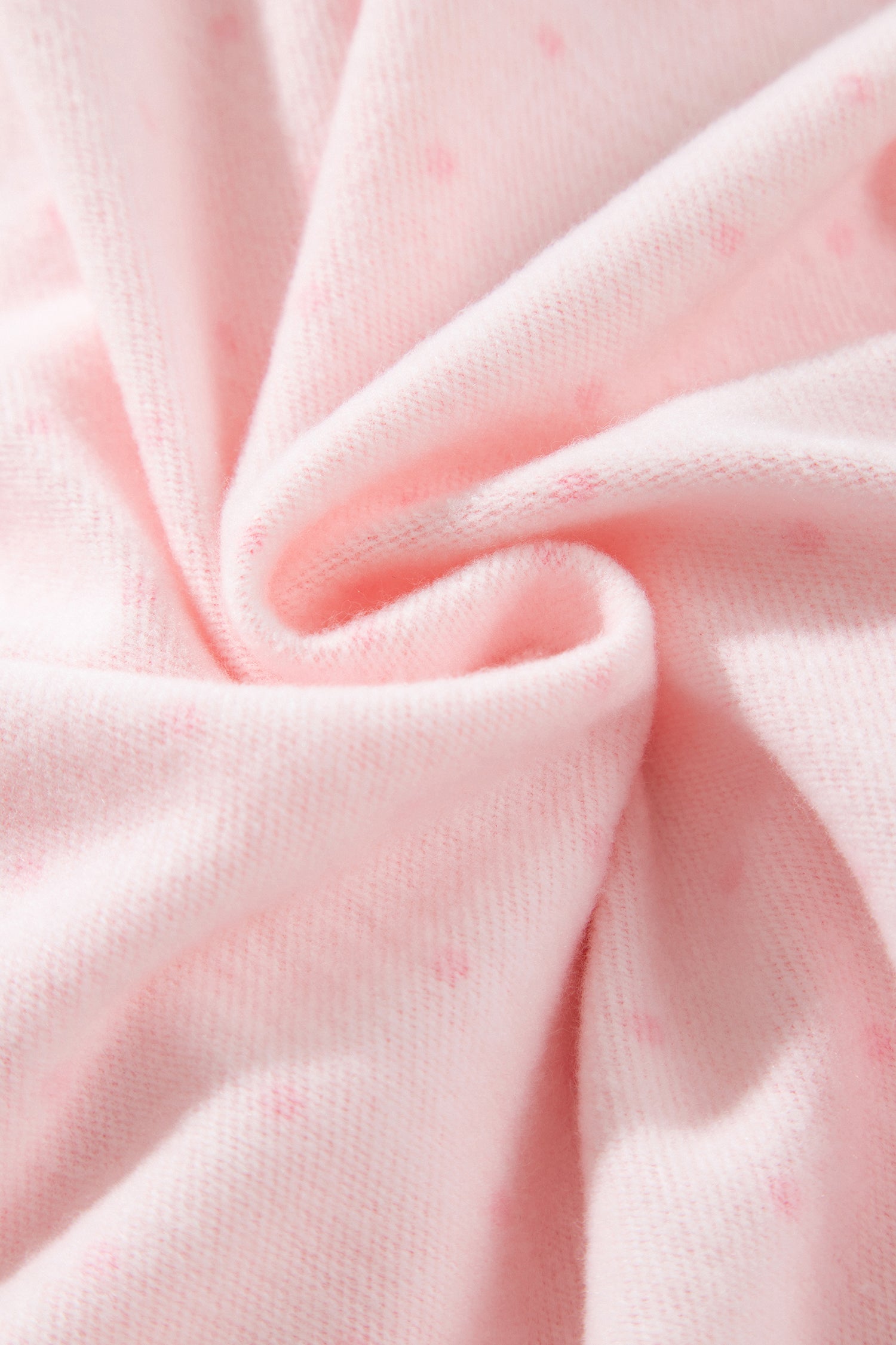 Soft pink brushed fleece lining close-up