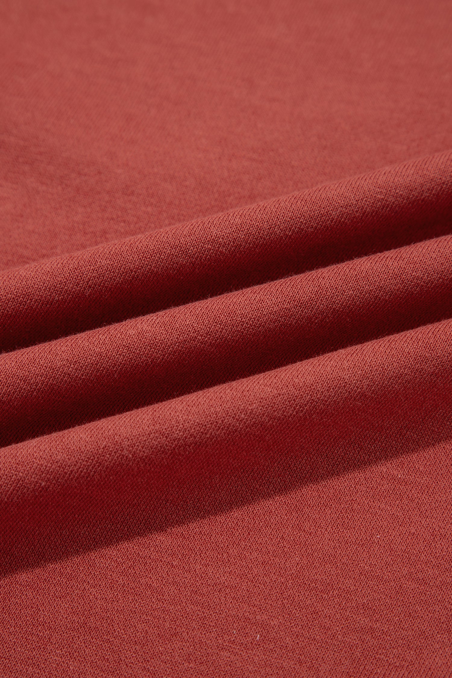 Close-up of mineral red sweatshirt fabric