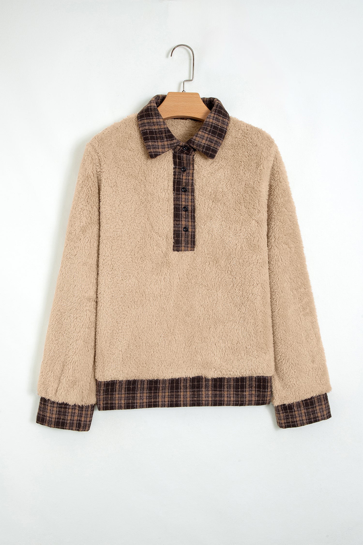 Beige sherpa fleece pullover with plaid collar on a hanger, front view