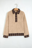 Beige sherpa fleece pullover with plaid collar on a hanger, front view