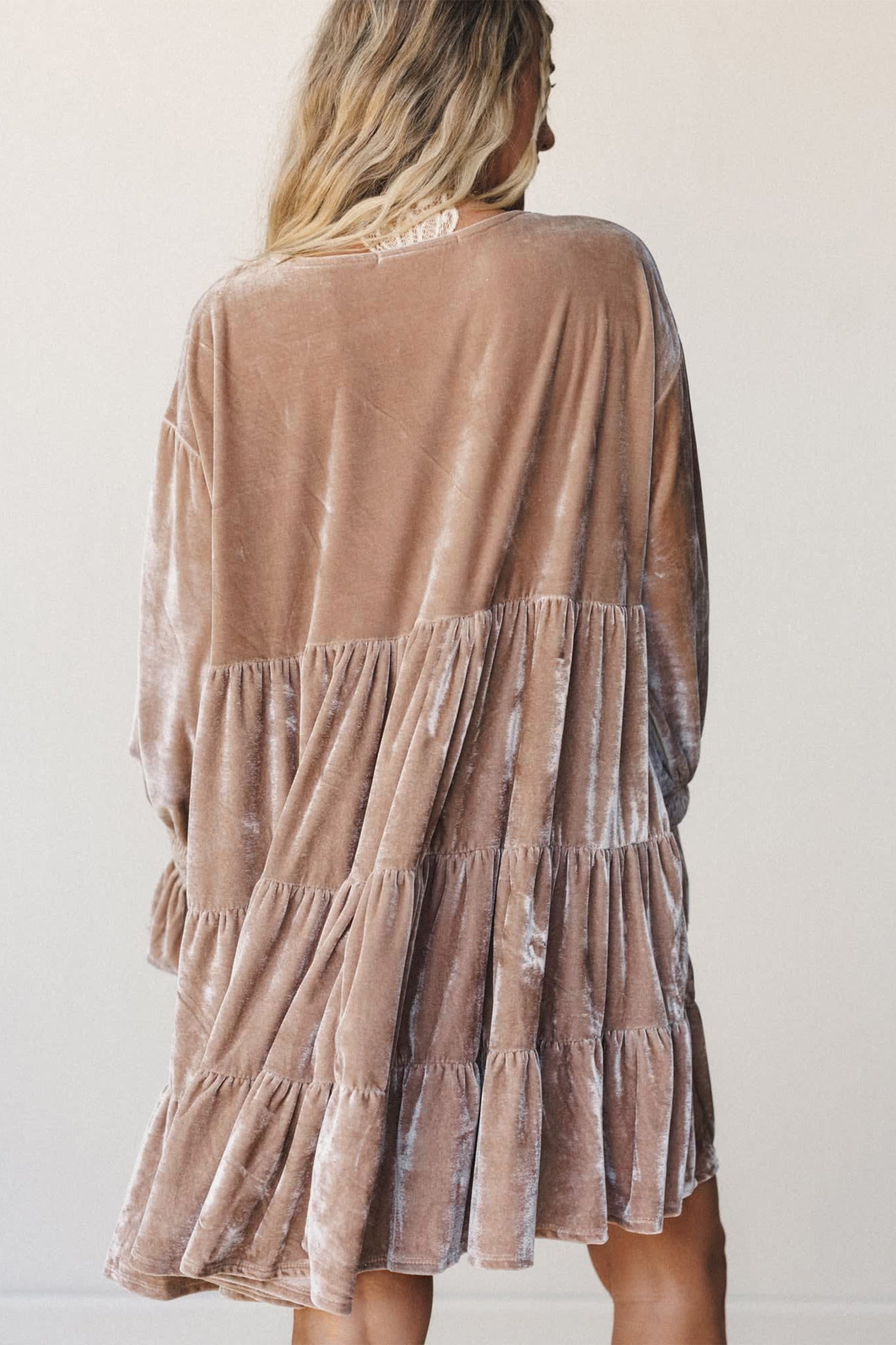 Women's velvet tiered mini dress, back view