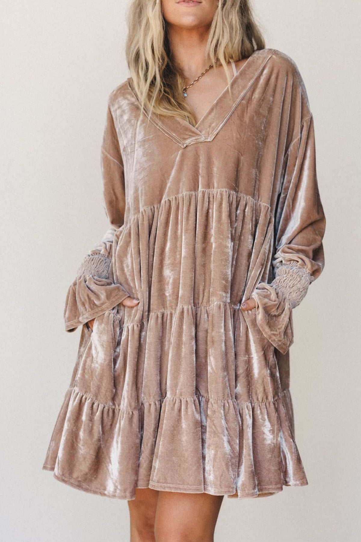 Women's velvet tiered V neck long sleeve mini dress with side pockets, front view